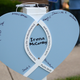 Heart with the name of Irena McCarthy, was was killed on July 4, is seen at the Highland Park Presbyterian Church during a vigin in Illinois on July 5, 2022.